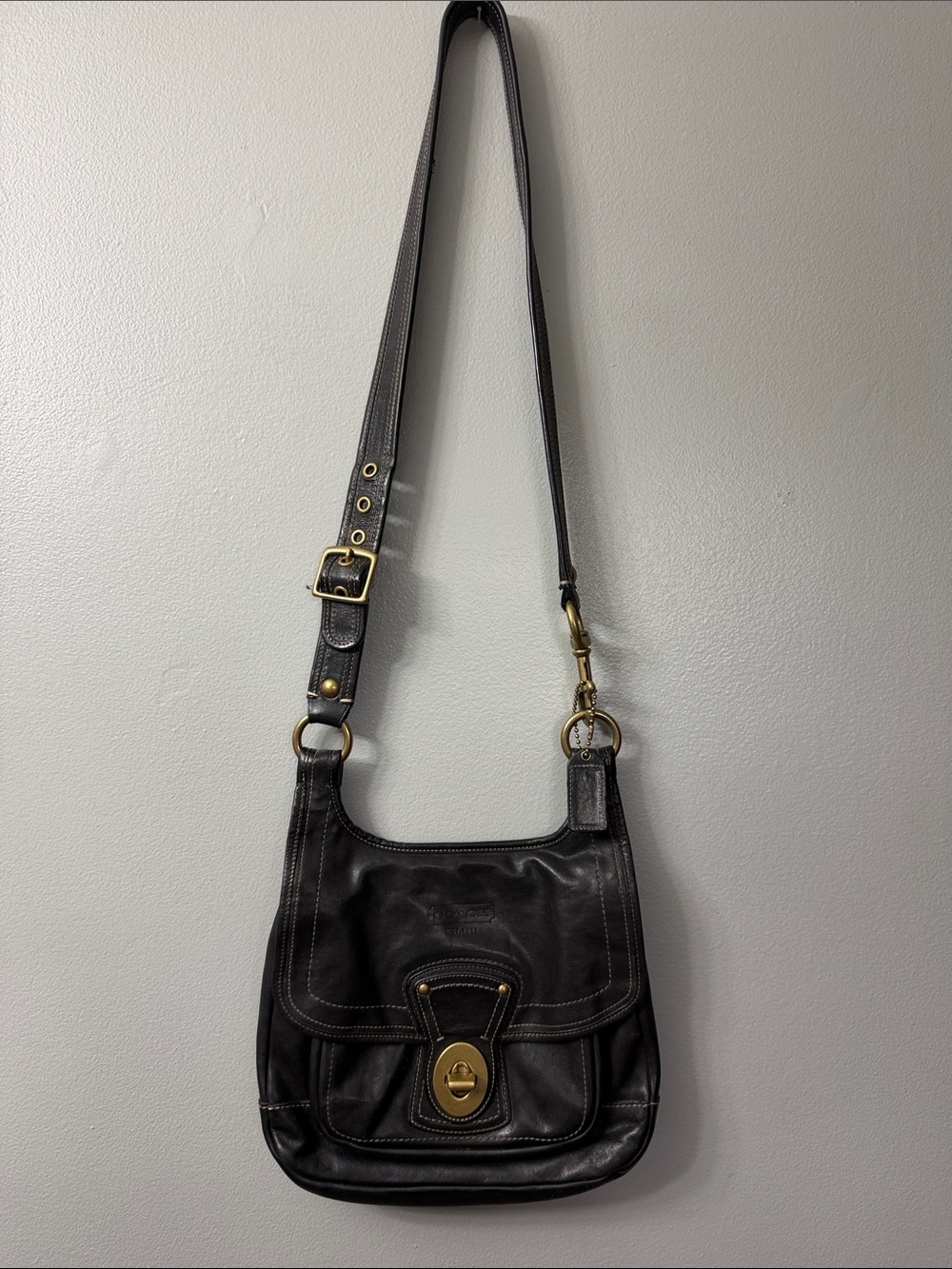 Coach 65th Anniversary Legacy Black Leather Hippie Crossbody Bag, model #10325.